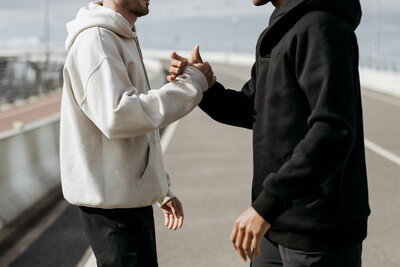 Personal trainers high-fiving