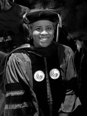 Dr. Qiana Cutts professor at MSU also owner of honey and hotsauce candles Mo Davis