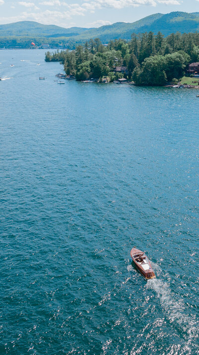 Aerial view of a small boat on a lake