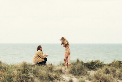 A surprise proposal captured by Eilish Burt Photography on the Mount Maunganui Beach