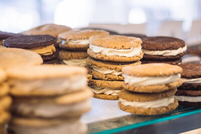 Stacked ginger molasses cookies with creamy filling on display at Gold Leaf Pastries in Kamloops BC.