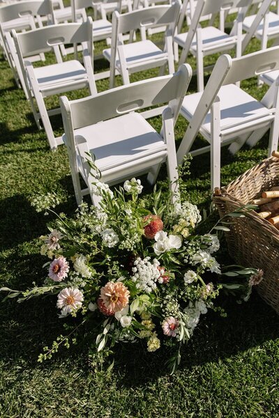 Wedding ceremony chairs and flowers by wedding photographer northern california Erica Rochelle