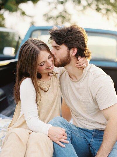 A candid engagement moment filled with love, beautifully captured by Morgan Alysse Photography. Serving Lafayette, LA, and all of Louisiana, Morgan specializes in light and airy photography that highlights the natural connection between couples.