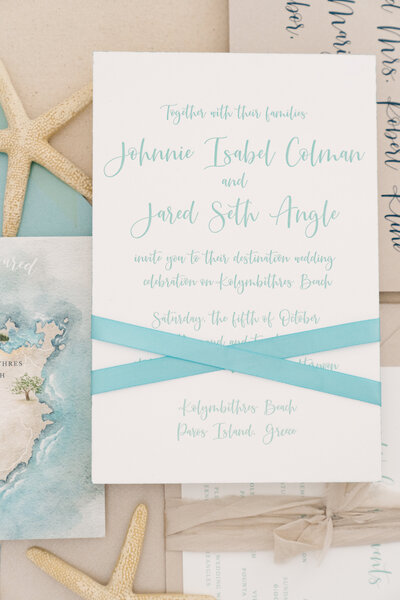 Couple's name imprinted on pocket of invitation