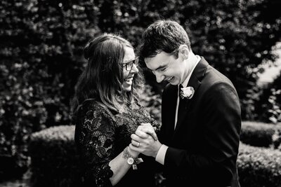 Mother and son hug on wedding day