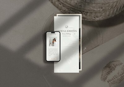 Luxury wedding planner brand kit mockup for Athena Kristen, featuring mobile-optimized Showit website design and elegant stationery layout in neutral tones.