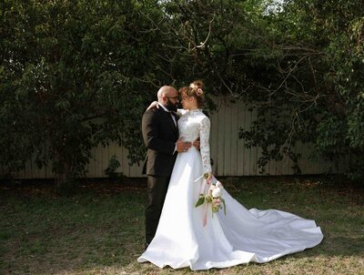 Austin Wedding Photographer bride and groom poses at The Taylor Mansion