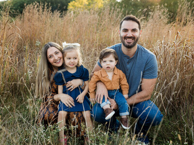 brothers running in park park for family photoshoot at westcreek reservation parma ohio cleveland family photography