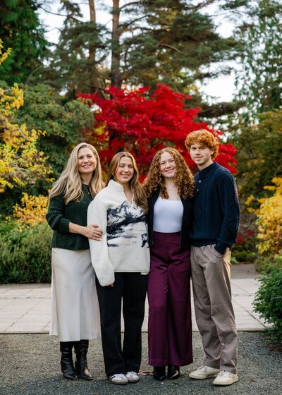 family and senior at bellevue botanical garden in fall