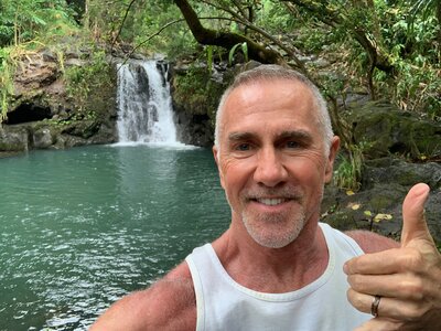 Brent Ragan by waterfall