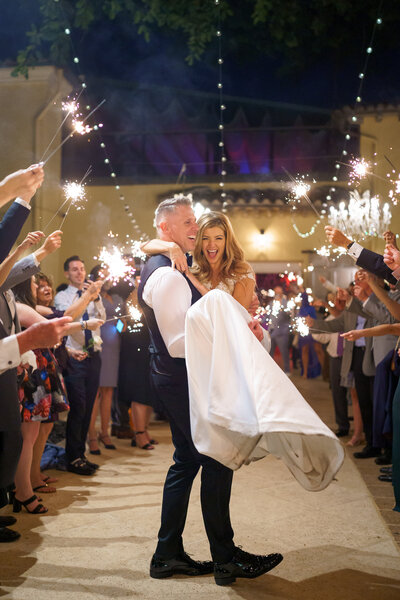 Sparkler send off photos with bride and groom