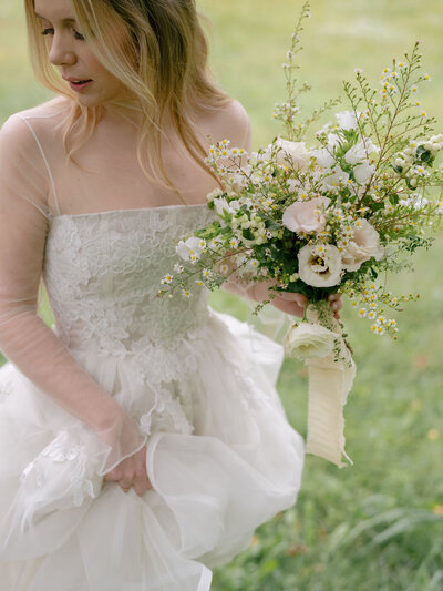 Bride in Wedding Dress with Wedding Bouquet