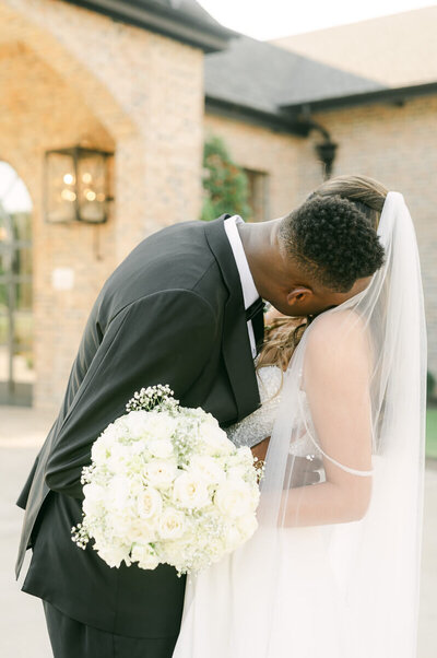 bride and groom outside iron manor