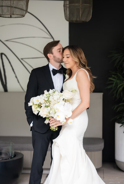 A couple embraces at the Kimpton Shane Hotel in Atlanta, GA