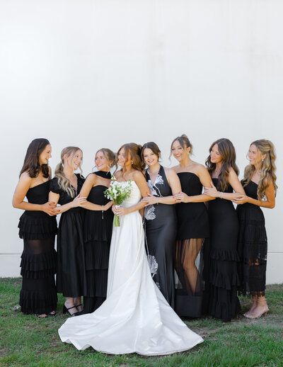 wedding ring next to a pink flower