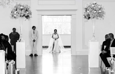 Emotional moment as the bride walks down the aisle with her father at a luxury Raleigh wedding.