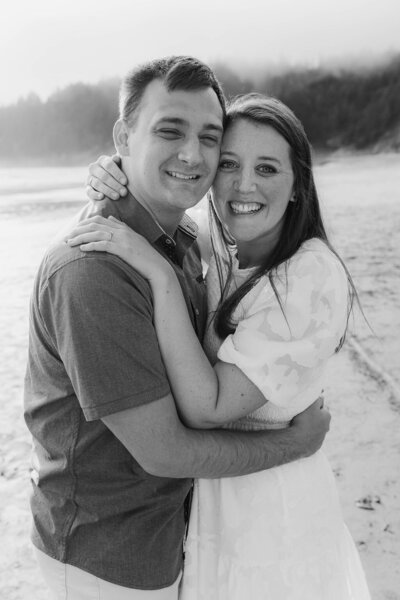 Husband and wife hugging 