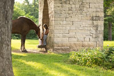 senior boy with horse and dog