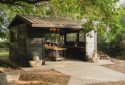 wedding arch mckinney_elegant receptions_crescent moon venue_outdoor kitchen