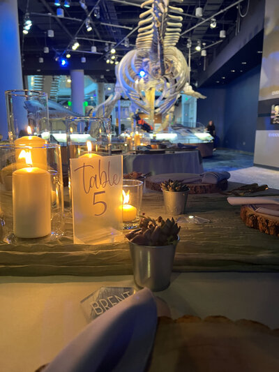 Candlelit reception table with table number