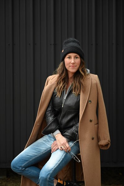 Portrait of Kate Lyster, owner and principal designer of Sandpoint's Base Camp Design, a leading interior design firm specializing in modern rustic and mountain Scandinavian styles.