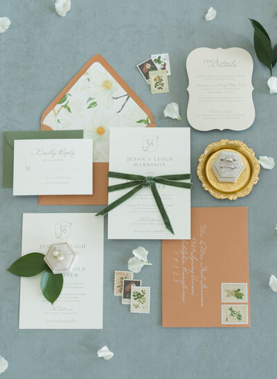 greenery and floral wedding invitation with vellum wrap and gold foil
