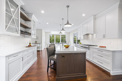 White kitchen with dark wood features