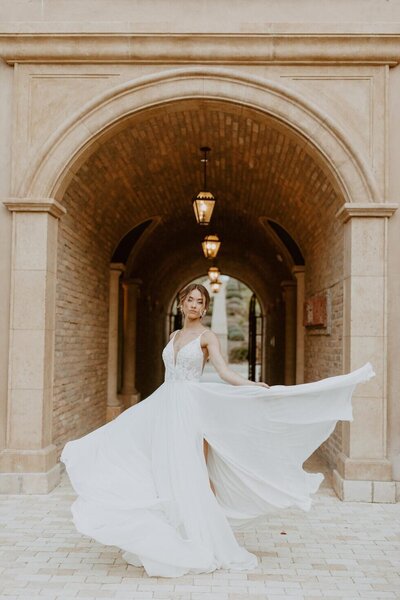 MODERN FAIRYTALE WEDDING DRESS A modern take on a traditional silhouette, this updated ballgown has everything you need to make your fairytale wedding day come to life! Truly the focal point of this wedding dress, the bodice of this gown is the perfect mixture of ivory and silver lace and pearl and silver beadwork, making this the perfect gown to twinkle the night away in. Complete with a sweetheart neckline, the bodice of this gown is accentuated with lace straps that feature enhanced beading, only adding to the glam factor. The full, tulle ballgown skirt extends effortlessly from the waist, extending to the ground beautifully. The back of this stunning ballgown features a beaded, strappy back – a style that’s completely modern and on trend. Looking to add a bit more sparkle to this style? The ballgown skirt is also available with a sequin underlay. The back of this ballgown zips up beneath crystal buttons.