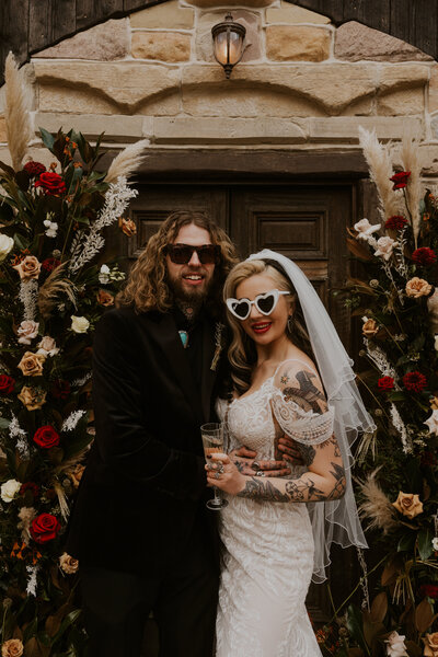 A couple radiating alternative wedding vibes, expressing their unique style and creating a cool and unconventional celebration.