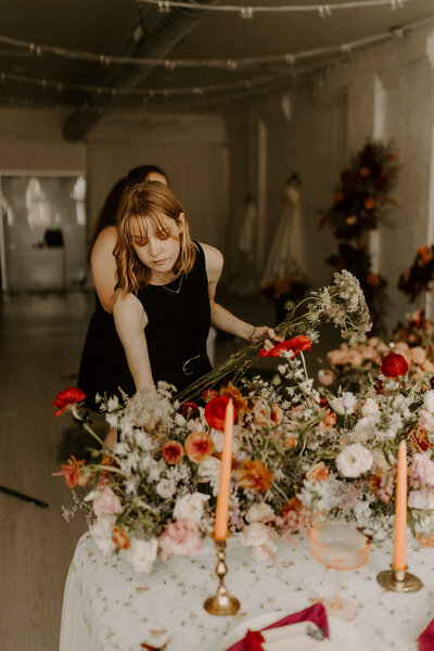 black and white image woman holding flowers