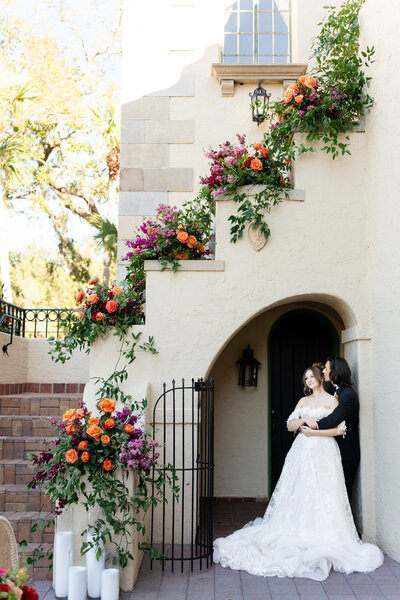 Sarasota wedding with florals cascading down stairs