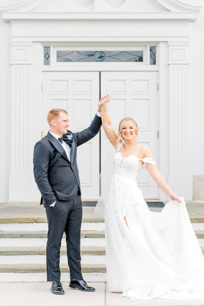 Newlyweds Mark and Emily underneath Carrigan Farms' willow tree captured by Charlotte NC wedding photographer