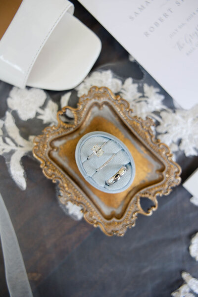 detail shots of ring and invitations atlanta wedding