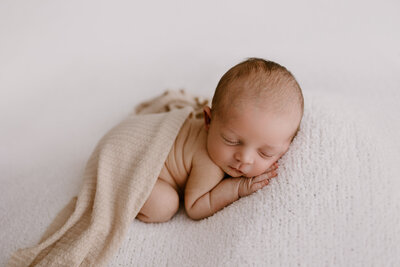 All white studio newborn session