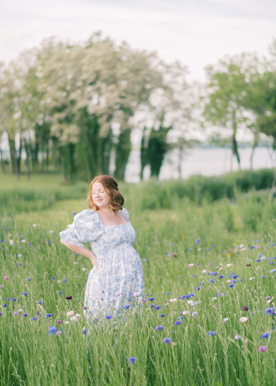Pregnant woman in field of flowers