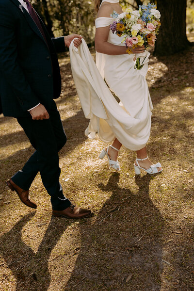 Wedding photography brides wedding shoes on her wedding day 
