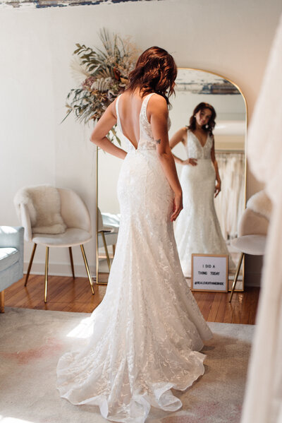 Bride trying on gowns at Everthine Bridal Boutique
