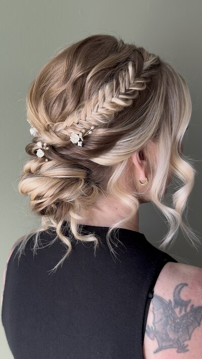 low messy updo with braid blonde hair
