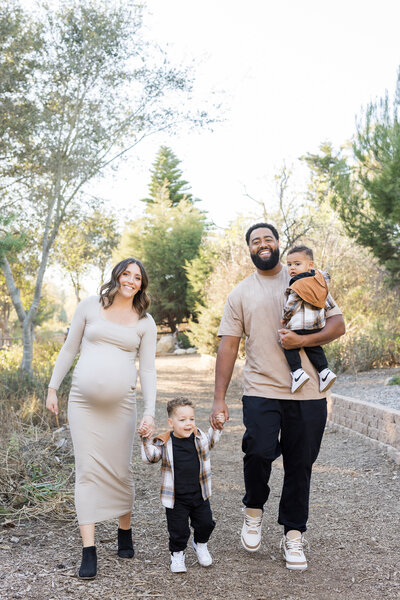 family photo in the woods with two kids