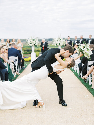 Bride and groom dip kiss captured by Boulder Wedding Photographer