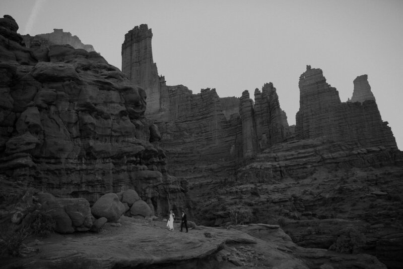 Couple walks together in Moab Utah