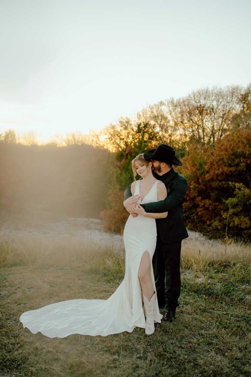 bride and groom sunset portrait at their fall okc wedding