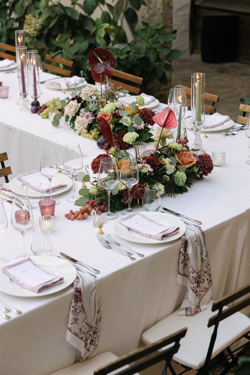 A bride sipping champagne while getting ready for her wedding day, captured in an elegant, editorial style. Photographed by Alexia Rodriquez, a destination wedding photographer specializing in timeless, luxury wedding imagery.