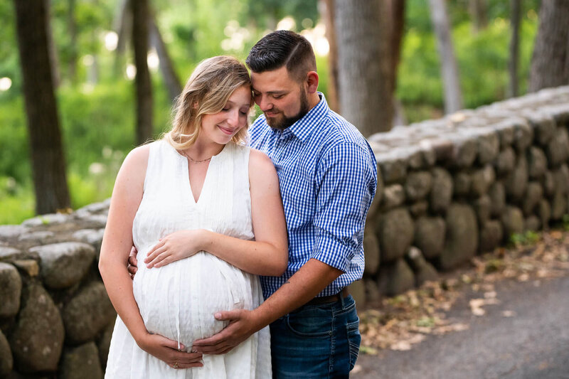 Fond du Lac maternity photo couple in woods | Glory Be Photography by Tara Bos