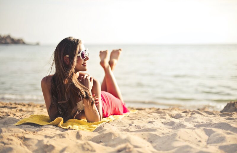 girl relaxing on beach
