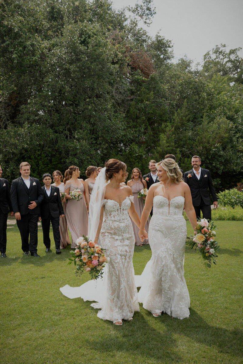 Bride and groom pour champagne tower