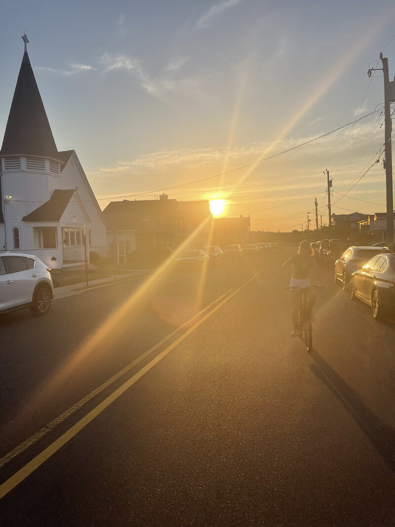 KRISTEN RIDING HER BIKE