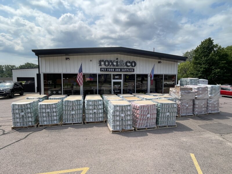 NutriSource pet food donation in front of Roxi & Co pet store in Sioux Falls for local rescues