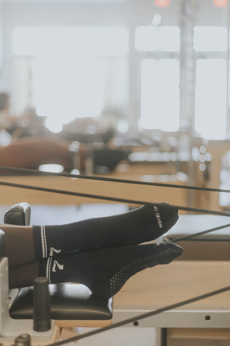 Regina teaching a Pilates class 