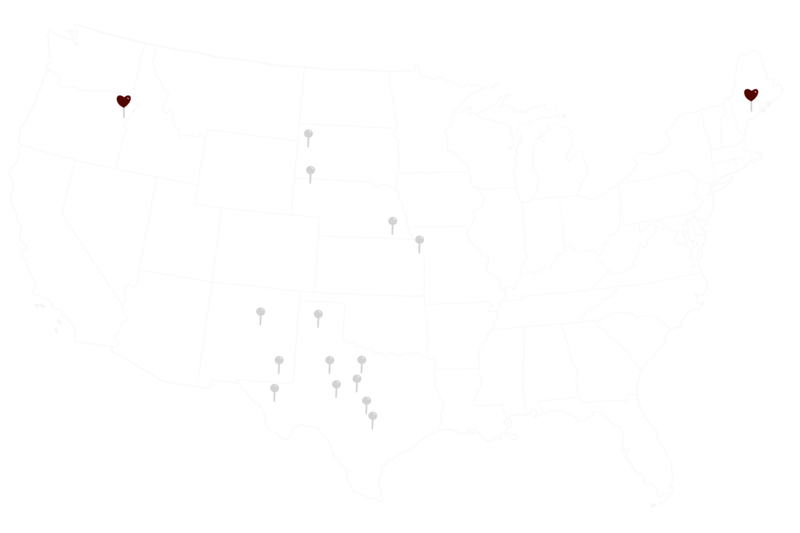Outlined Map of the United States with heart shape markers on Augusta, Maine location and Halfway,Oregon Location showing the two locations called home